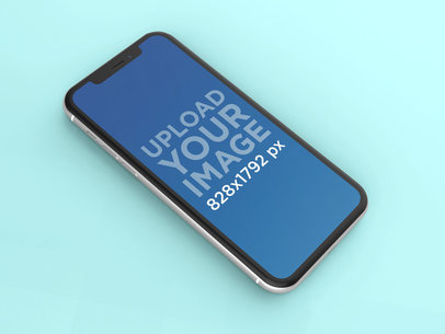 Angled White iPhone XR Mockup Lying on a Solid Surface 23138
