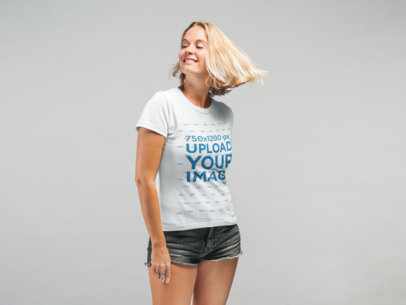 Mockup of a Woman Wearing a Tee and Flipping Her Hair