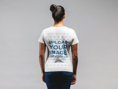 Back Shot Mockup of a Woman with a Messy Bun Wearing a T-Shirt