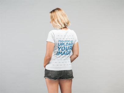 Back View T Shirt Mockup Featuring a Blonde Woman
