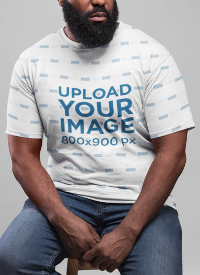 Sublimated T-Shirt Mockup Featuring a Serious Man with a Beard 