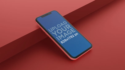 Angled Coral iPhone XR Mockup Lying Against a Step 23132