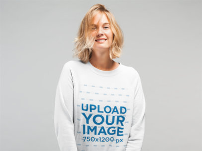 Mockup of a Woman With Messy Hair Wearing a Sweatshirt