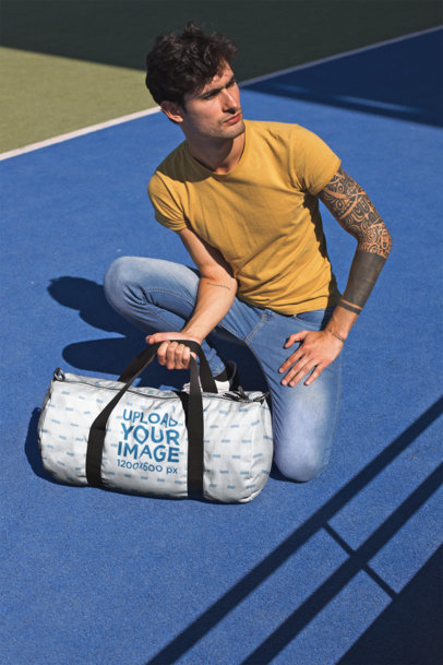 Mockup of a Man Picking up a Gym Bag
