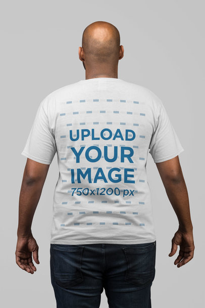 Back View Mockup of a Man Wearing a T-Shirt