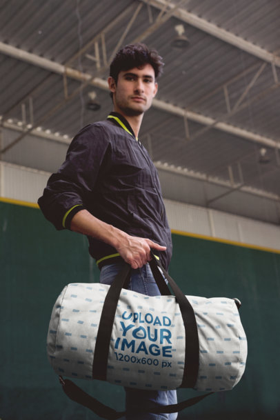 Mockup of a Young Man Carrying a Gym Bag