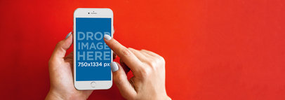 Mockup of a Woman Using an iPhone 6 Over a Red Background