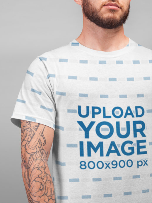 Closeup Mockup of a Bearded Man Wearing a Tee in a Studio