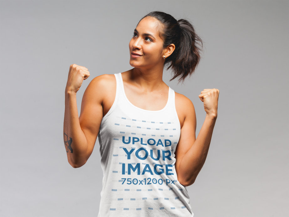 Tank Top Mockup Featuring a Sporty Muscular Woman Wearing a Tank Top
