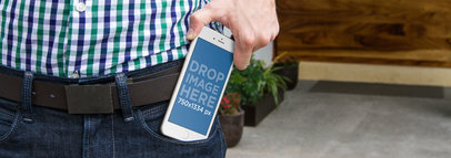 Man Putting His iPhone in His Pocket Mockup Template a4423