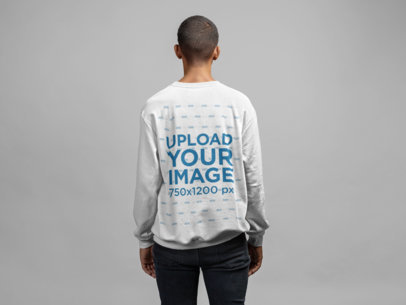 Crewneck Sweatshirt Back View Mockup Featuring a Short-Haired Man in a Studio