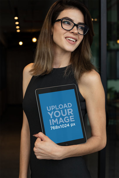 Mockup of a Businesswoman Holding an iPad 22817