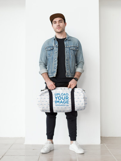 Mockup of a Kit Bag Carried by a Trendy Man