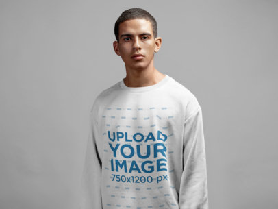 Mockup of a Serious Short-Haired Man Wearing a Sweatshirt in a Photo Studio