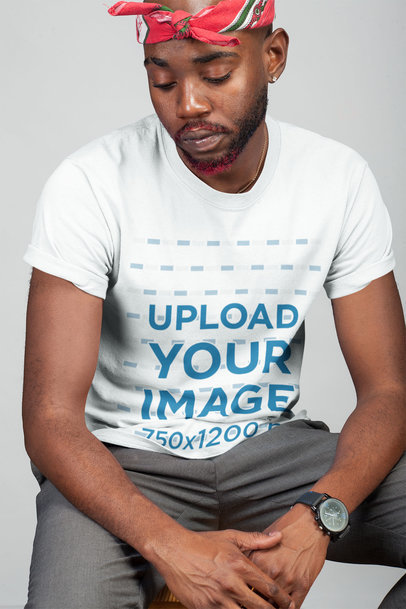 Simple Mockup of a Man Wearing a T-Shirt in a Studio