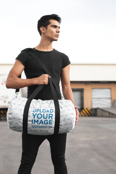 Mockup of a Strong Man Carrying a Kit Bag 23234