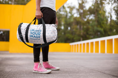 Gym Bag Mockup of a Man Wearing Pink Sneakers