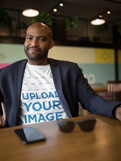 T-Shirt Mockup of a Businessman with a Blazer