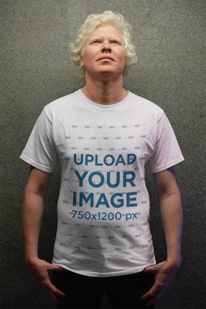 Mockup of a Man Wearing a T-Shirt Looking Above