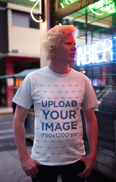 T-Shirt Mockup Featuring a Serious Man on the Street