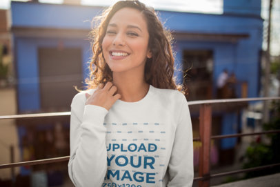 Sweatshirt Mockup of a Happy Woman on a Balcony
