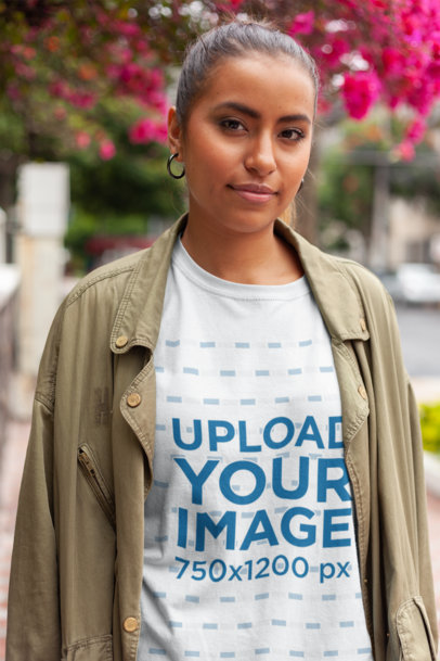 Unisex T-Shirt Mockup Featuring a Woman Out and About with a Casual Look