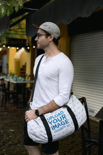 Duffle Bag Mockup of a Man Looking for a Restaurant
