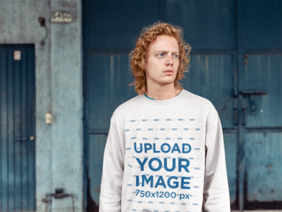 Mockup of a Red-Haired Man Wearing a Crewneck Sweater
