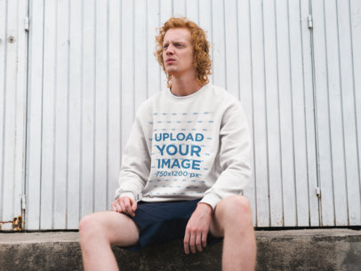 Mockup of a Somber Man with Red Hair Wearing a Crew Neck Sweater