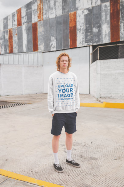 Mockup of a Serious Man with Red Hair Wearing a Crewneck Sweatshirt