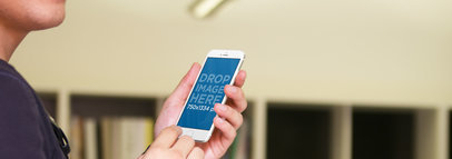 Young Man Holding White iPhone 6 Mockup Template