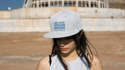 Video of a Hispanic Girl Wearing a Snapback Hat at an Abandoned Place 14199