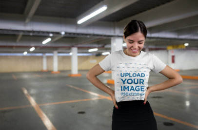 Round-Neck Tee Mockup of a Young Stylish Woman in a Parking Lot