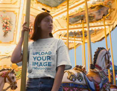 Unisex Tee Mockup of a Serious Woman on a Carousel