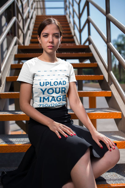 Tee Mockup of a Fashionable Woman Wearing a Dark Skirt and Small Hoop Earrings  20695