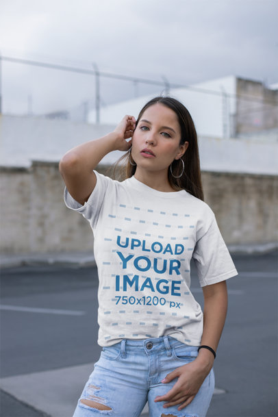 Unisex Tee Mockup Featuring a Beautiful Woman Looking Towards the Camera