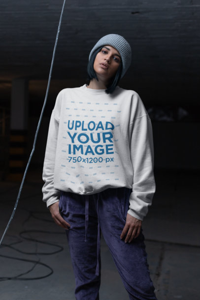 Mockup of a Serious Woman Wearing a Sweater in a Dark Room