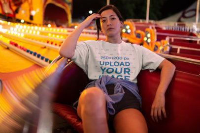 Unisex Tee Mockup of a Woman Riding a Carnival Ride