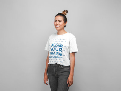 Mockup of a Woman with a Top Knot Wearing a Unisex Tee