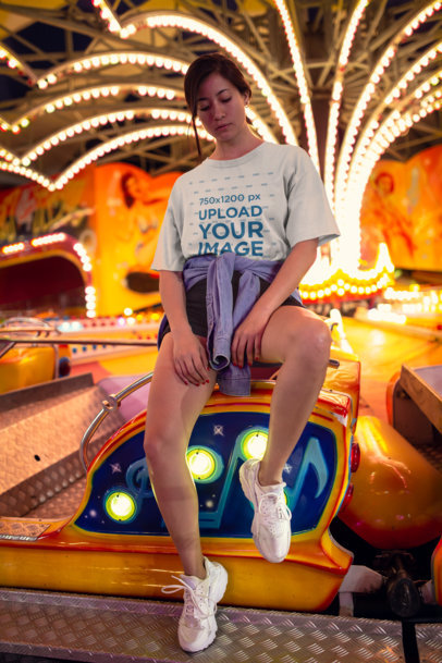 Mockup of a Unisex Tee Featuring a Cool Woman on a Fair Ride