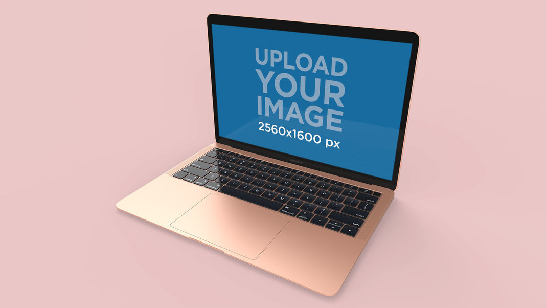Mockup of a Gold MacBook Air Standing on a Solid Color Surface