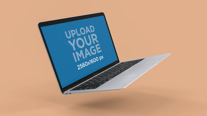 Render Mockup of a Silver MacBook Air Floating Over a Surface 23683