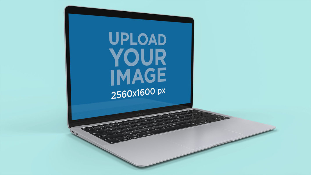 Silver MacBook Laptop Mockup Resting On a Colored Surface