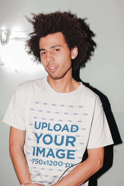 Simple Mockup of a Man Wearing a T-Shirt Posing in Flash Photography 18081