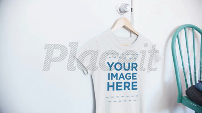 Video of a T-Shirt Hanging on a Closet Door in a Bedroom