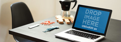 Macbook Mockup Template at a Creative Office Environment