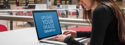 Laptop Mockup of a Girl Using her Macbook at the Cafeteria a4645