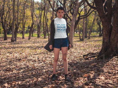 Tee Mockup of a Woman With a Pixie Cut Standing in the Middle of the Woods 20724