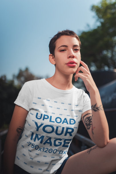 Mockup of an Alternative Woman Wearing a T-Shirt Outside