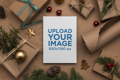 Mockup of an Xmas Card Surrounded by Gifts and Ornaments